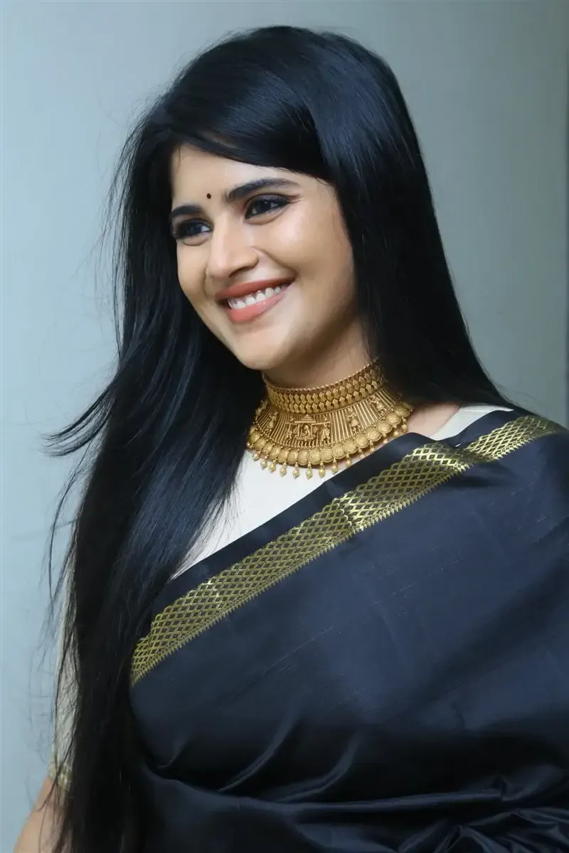 Megha Akash in Black Saree at Manu Charitra Telugu Movie Trailer Launch